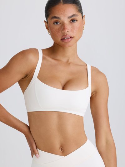 Oh Polly Soft Active Contrast-Trim Sports Bra in White