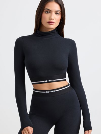Ohpolly Backless Turtleneck Long-Sleeve Crop Top in Black