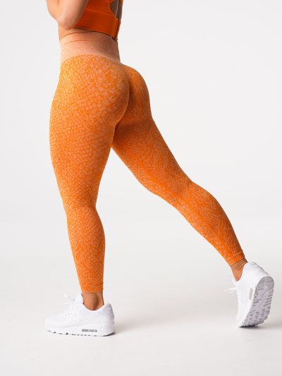 Nvgtn Burnt Orange Snakeskin Seamless Leggings